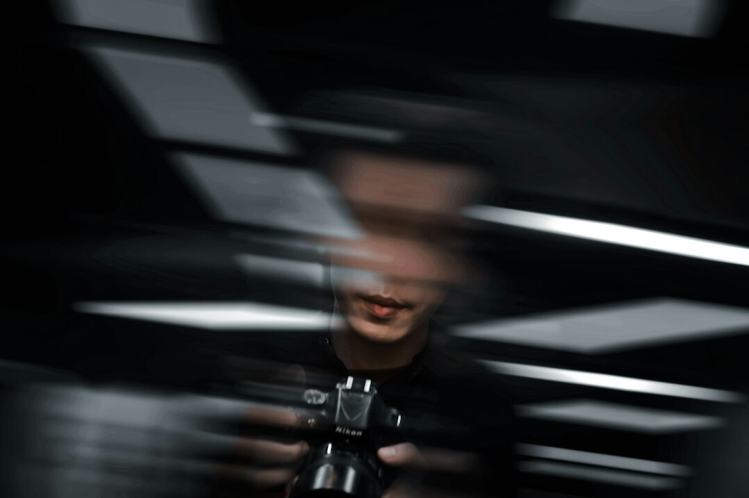 Camera operator panning a broadcast camera during a live television show
